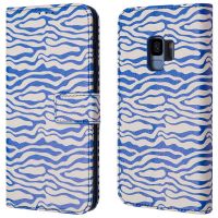 iMoshion ﻿Design Klapphülle für das Samsung Galaxy S9 - White Blue Stripes