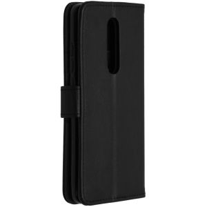 iMoshion Luxuriöse Klapphülle Schwarz für das Xiaomi Mi 9T (Pro)