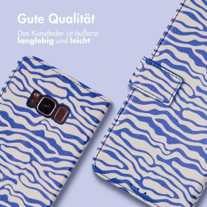 iMoshion ﻿Design Klapphülle für das Samsung Galaxy S8 - White Blue Stripes