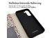 iMoshion Design Klapphülle für das Samsung Galaxy S21 FE - Black And White Dots