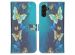 iMoshion Design TPU Klapphülle für das Samsung Galaxy A13 (5G) / A04s - Blue Butterfly