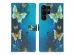 iMoshion Design TPU Klapphülle für das Samsung Galaxy S23 Ultra - Blue Butterfly