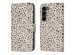 iMoshion ﻿Design Klapphülle für das Samsung Galaxy S23 - Black And White Dots