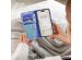 iMoshion ﻿Design Klapphülle für das Samsung Galaxy S23 - White Blue Stripes
