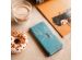 iMoshion Design Softcase Bookcase für das iPhone 15 - Blue Graphic