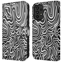 iMoshion Design Klapphülle für das Samsung Galaxy A33 - Black And White