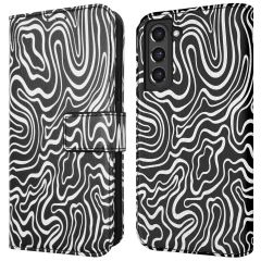 iMoshion Design Klapphülle für das Samsung Galaxy S21 FE - Black And White