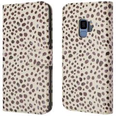 iMoshion ﻿Design Klapphülle für das Samsung Galaxy S9 - Black And White Dots