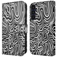 iMoshion Design Klapphülle für das Samsung Galaxy A55 - Black And White
