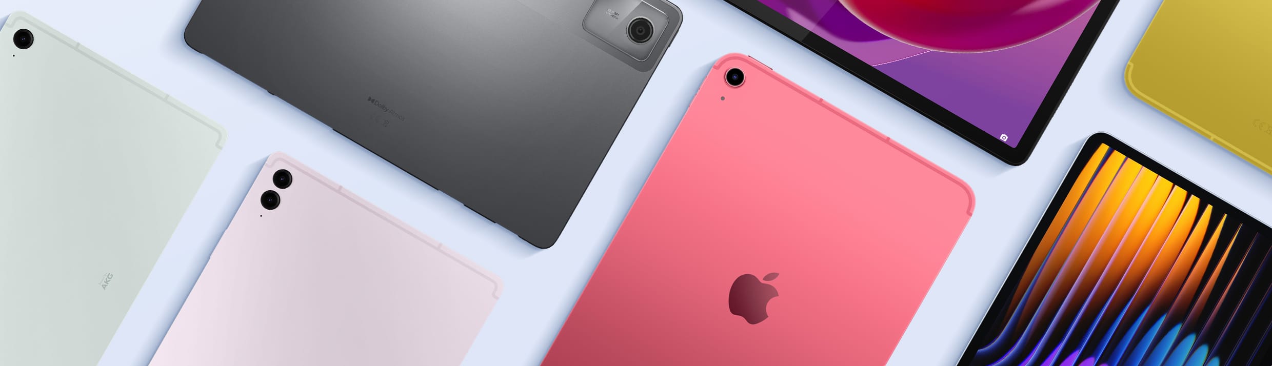 Mehrere Tablets auf einem hellblauen Hintergrund