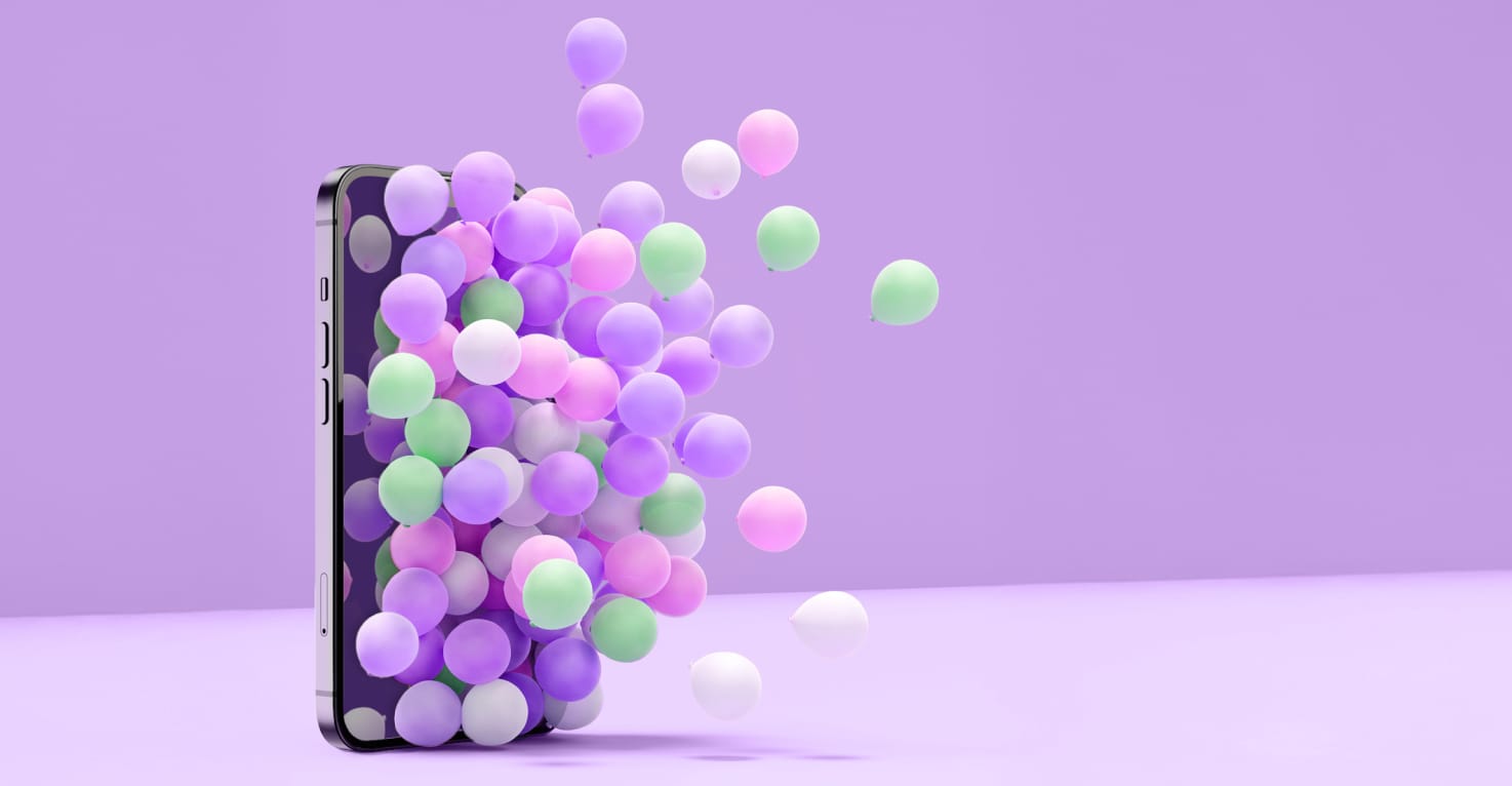 Ein unbekanntes iPhone mit Ballons auf violettem Hintergrund.